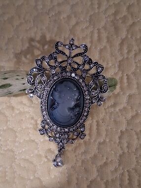 Ornate Silver-Tone Blue Cameo Brooch with Crystal Accents